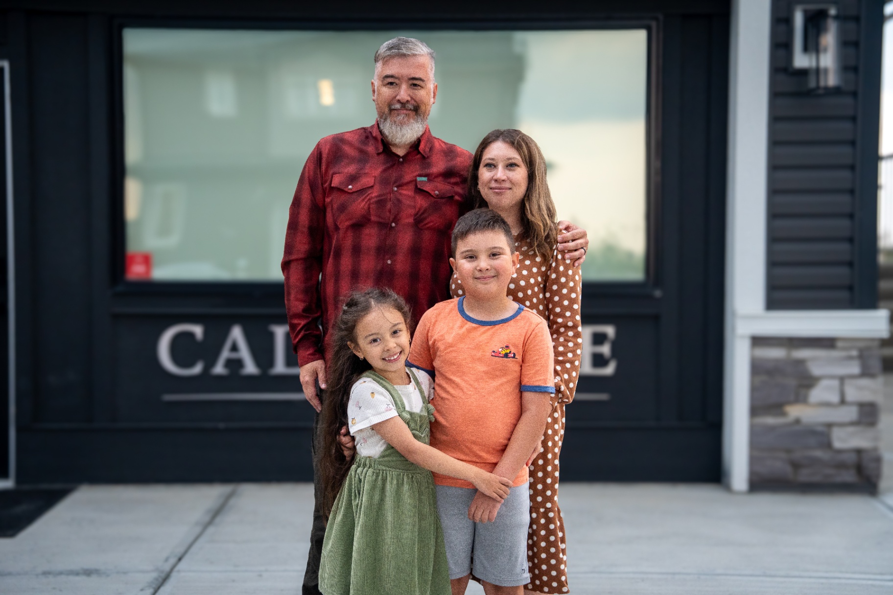 A Clearwater Park family at their front door